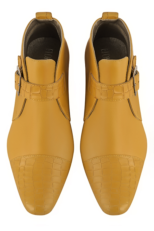 Mustard yellow women's ankle boots with buckles at the front. Round toe. Low block heels. Top view - Florence KOOIJMAN